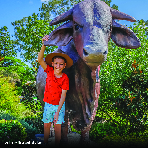 selfie with a bull statue