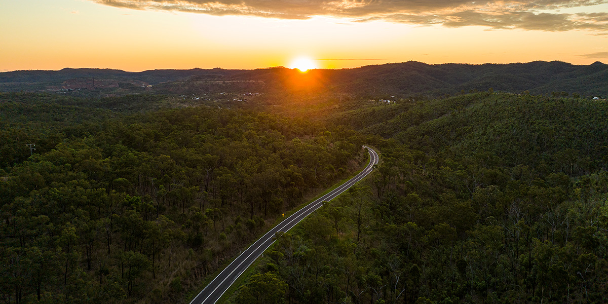 a view of the road leading to Mount Morgan up the range