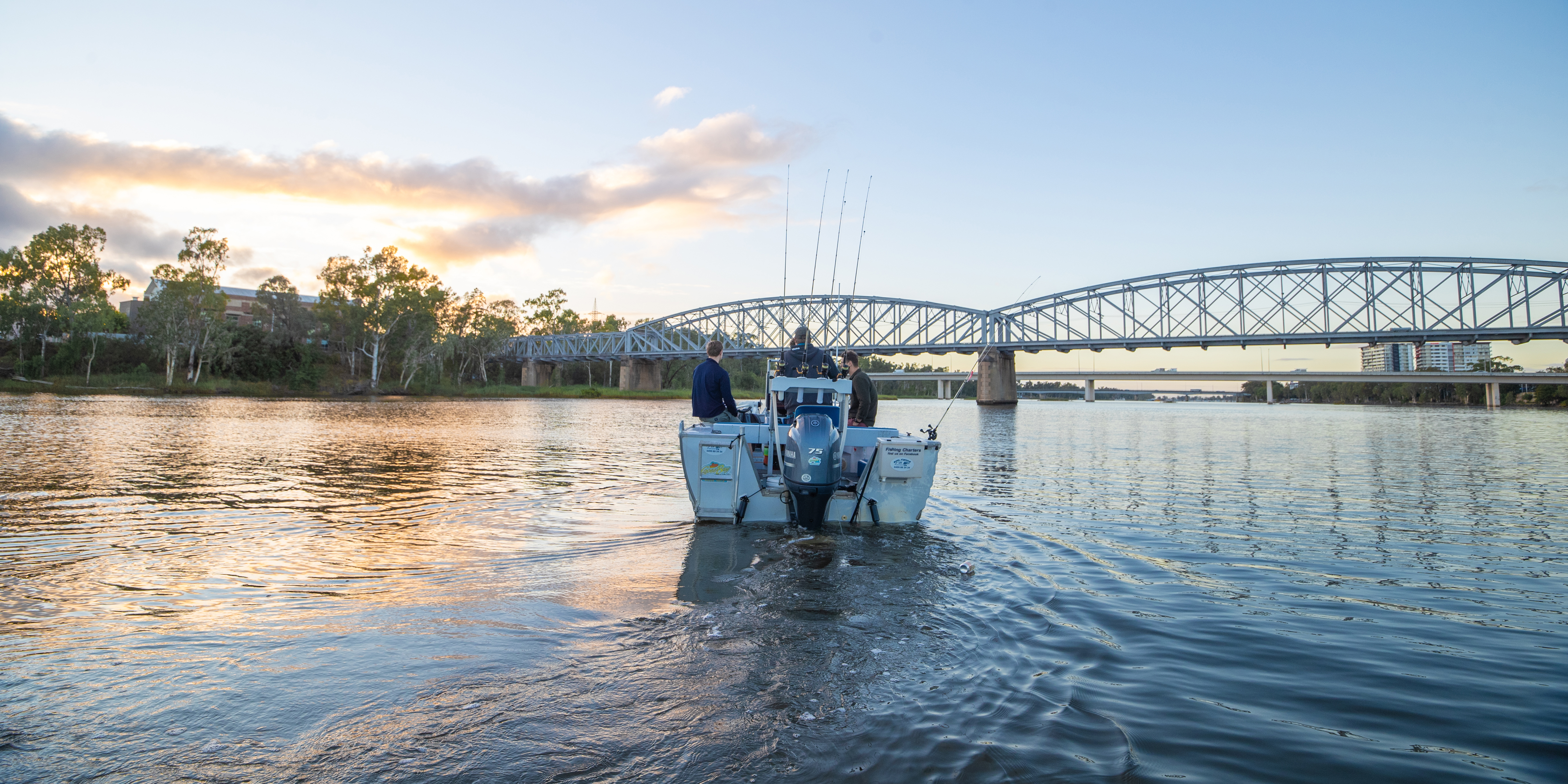 boat cruising up the Fitzroy River