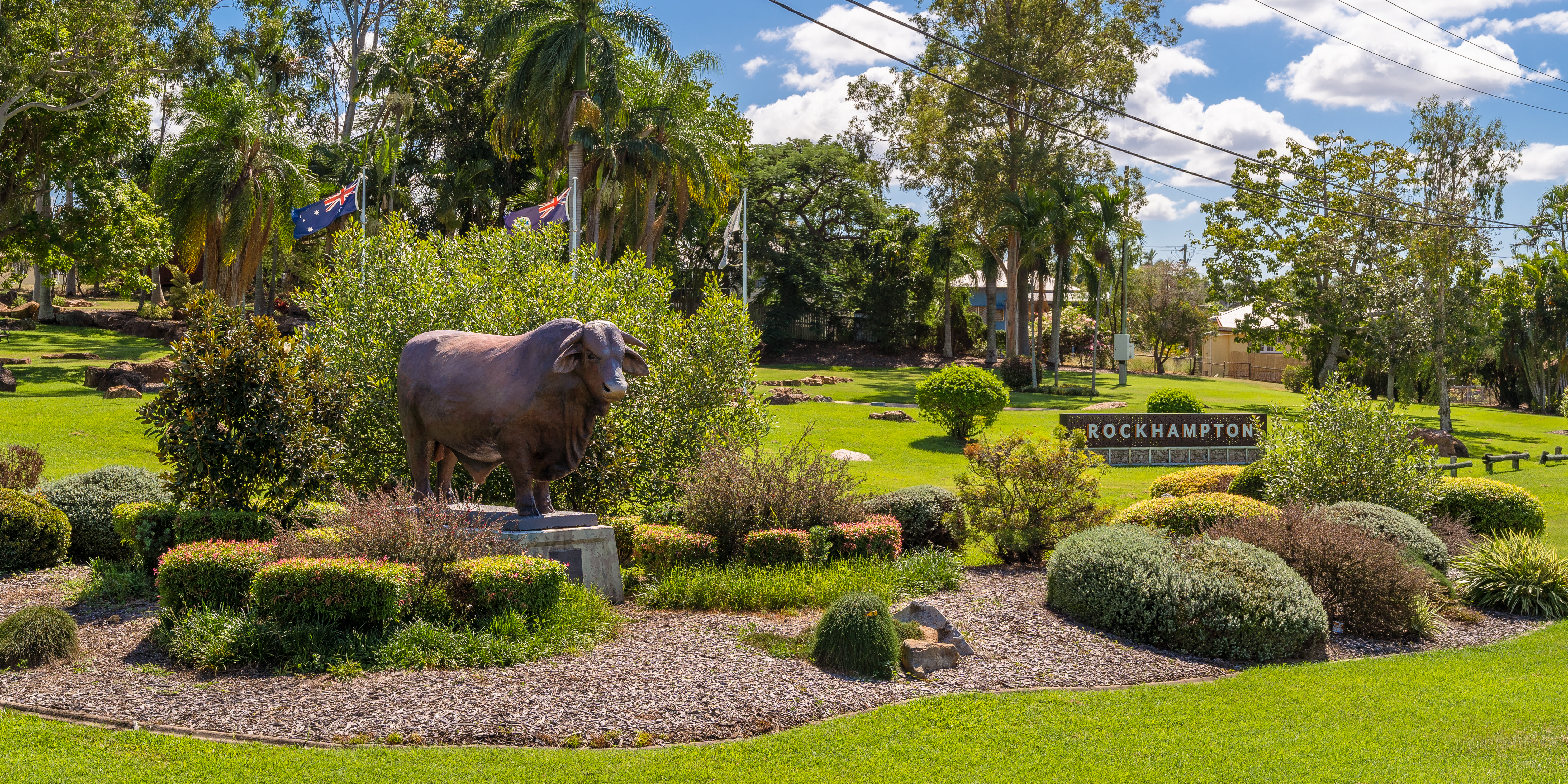 Bull Statue in a beautifully landscaped garden.