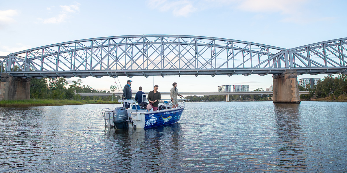 Fishing in a boat on the river