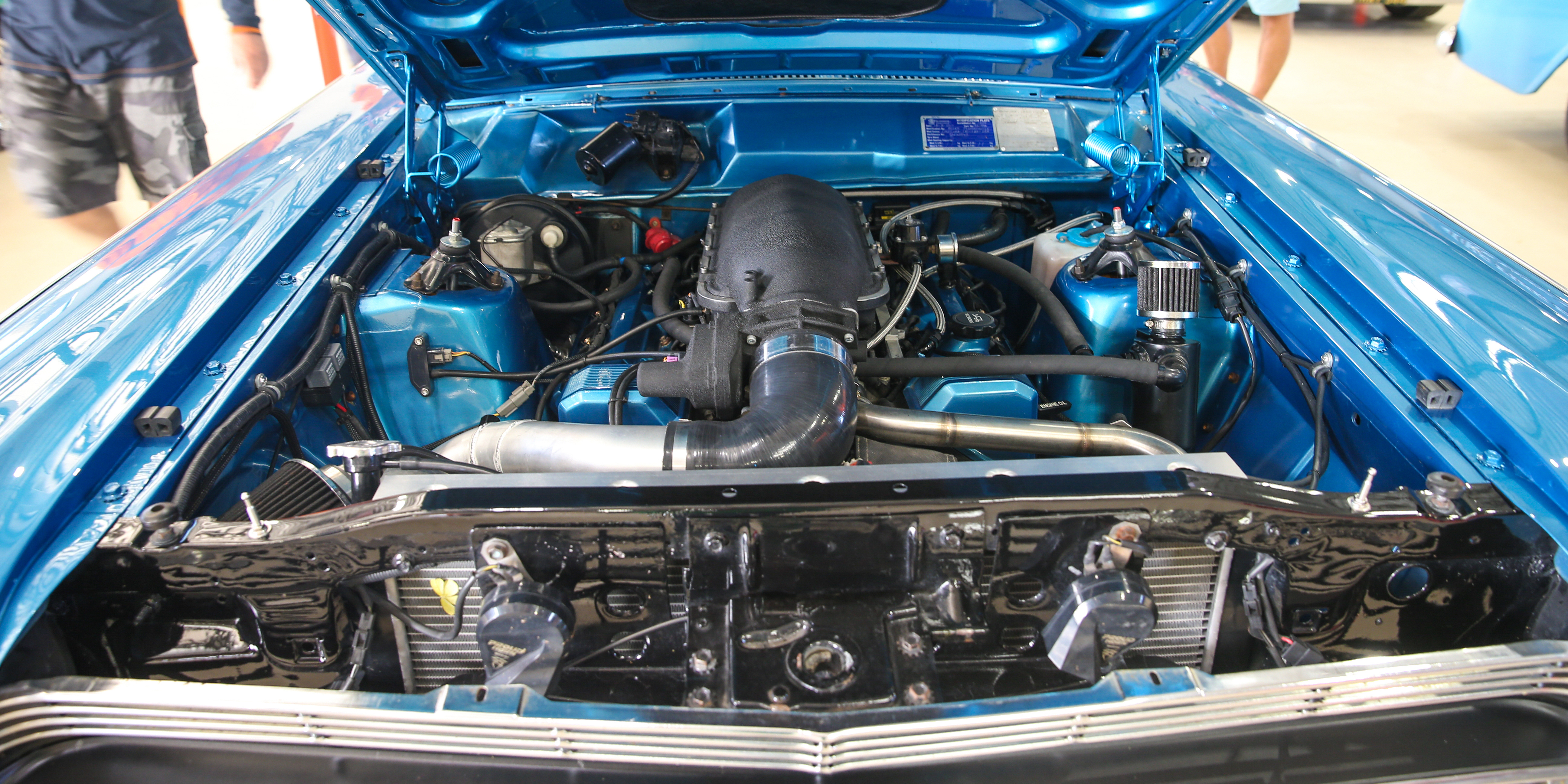 Looking under the hood of a classic car