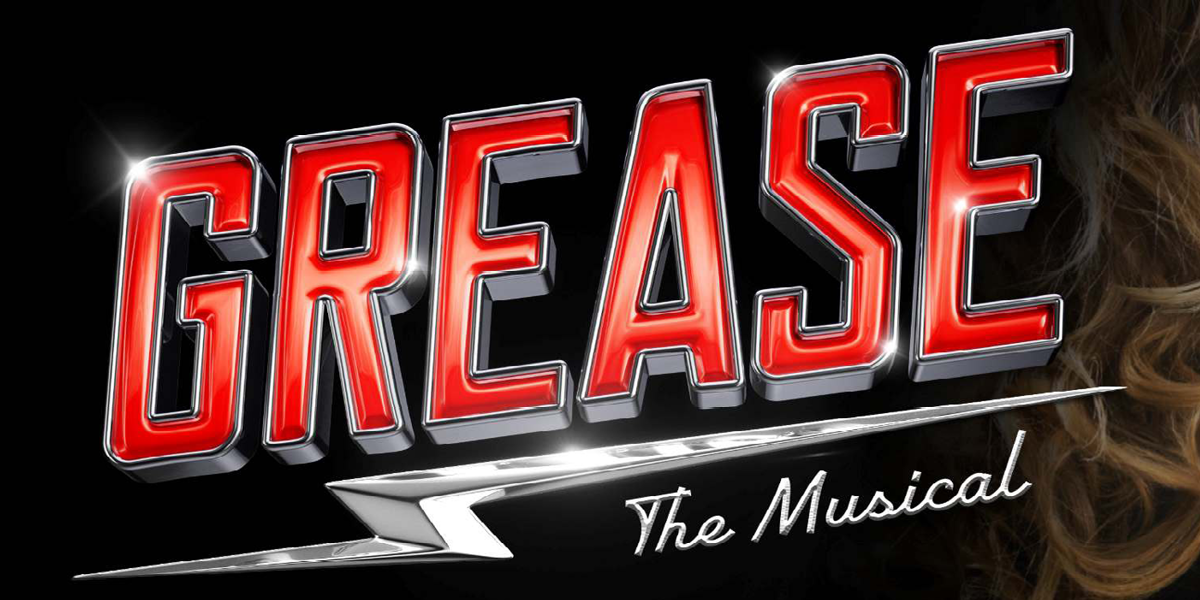 a black background with the words grease the musical