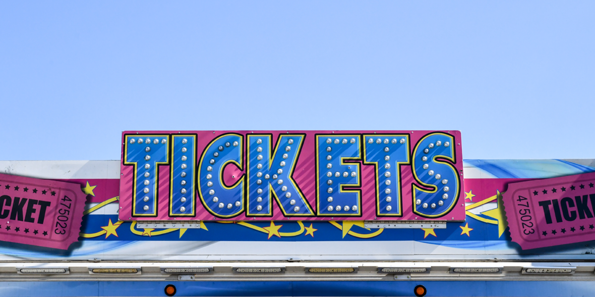 neon ticket booth sign