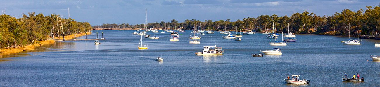a dotted vista of boats moored near the North Rockhampton Boat Ramp